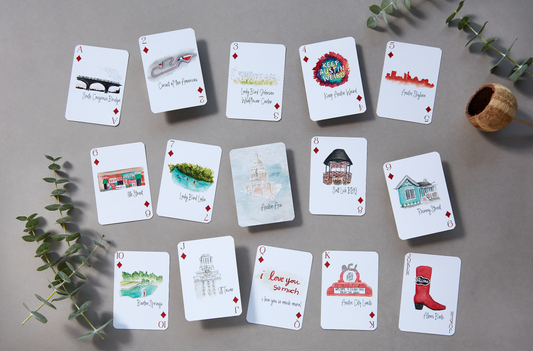 Austin-themed playing card deck featuring watercolor illustrations of city landmarks and culture including South Congress Bridge, Barton Springs, and Keep Austin Weird