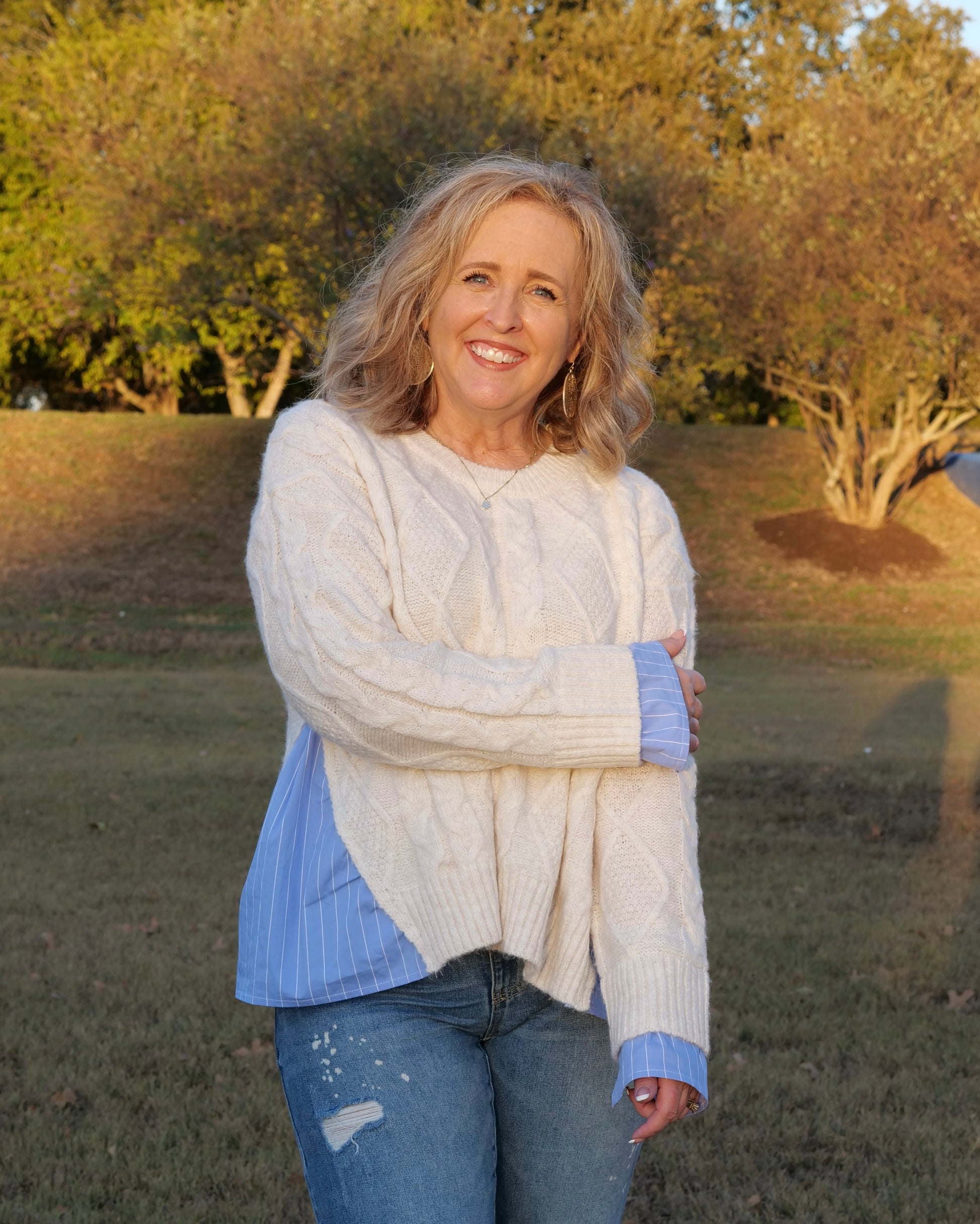 Blake Pullover - oversized cream cable-knit sweater with blue and white pinstripe shirting details at hem and cuffs, crew neckline, and long sleeves