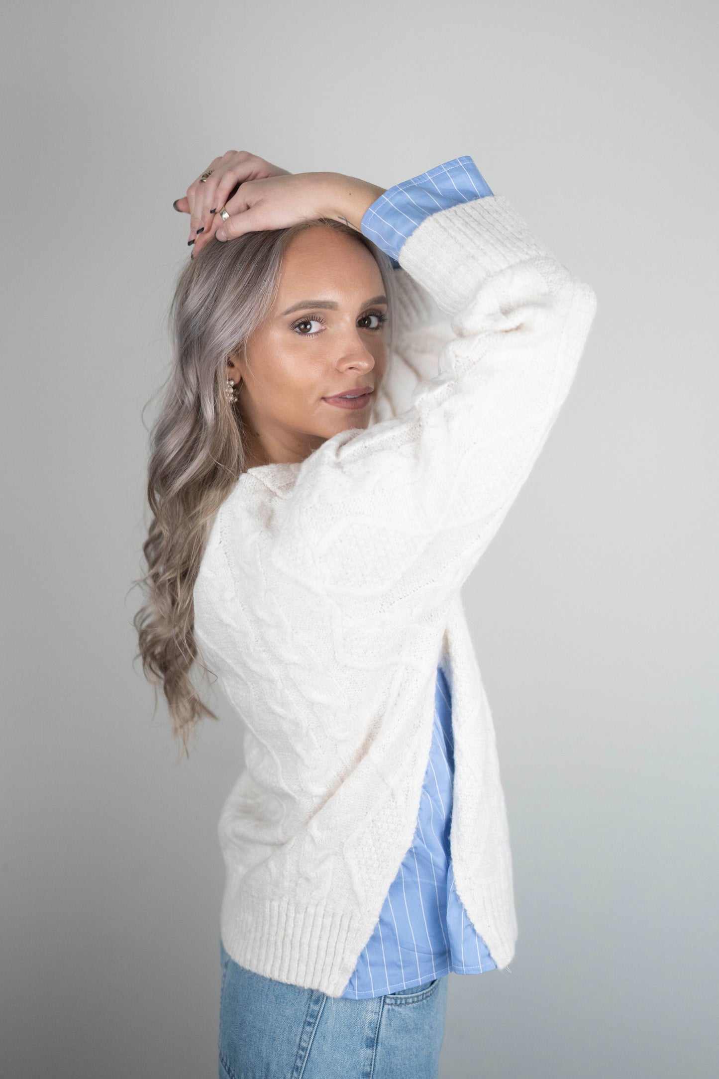 Blake Pullover - oversized cream cable-knit sweater with blue and white pinstripe shirting details at hem and cuffs, crew neckline, and long sleeves