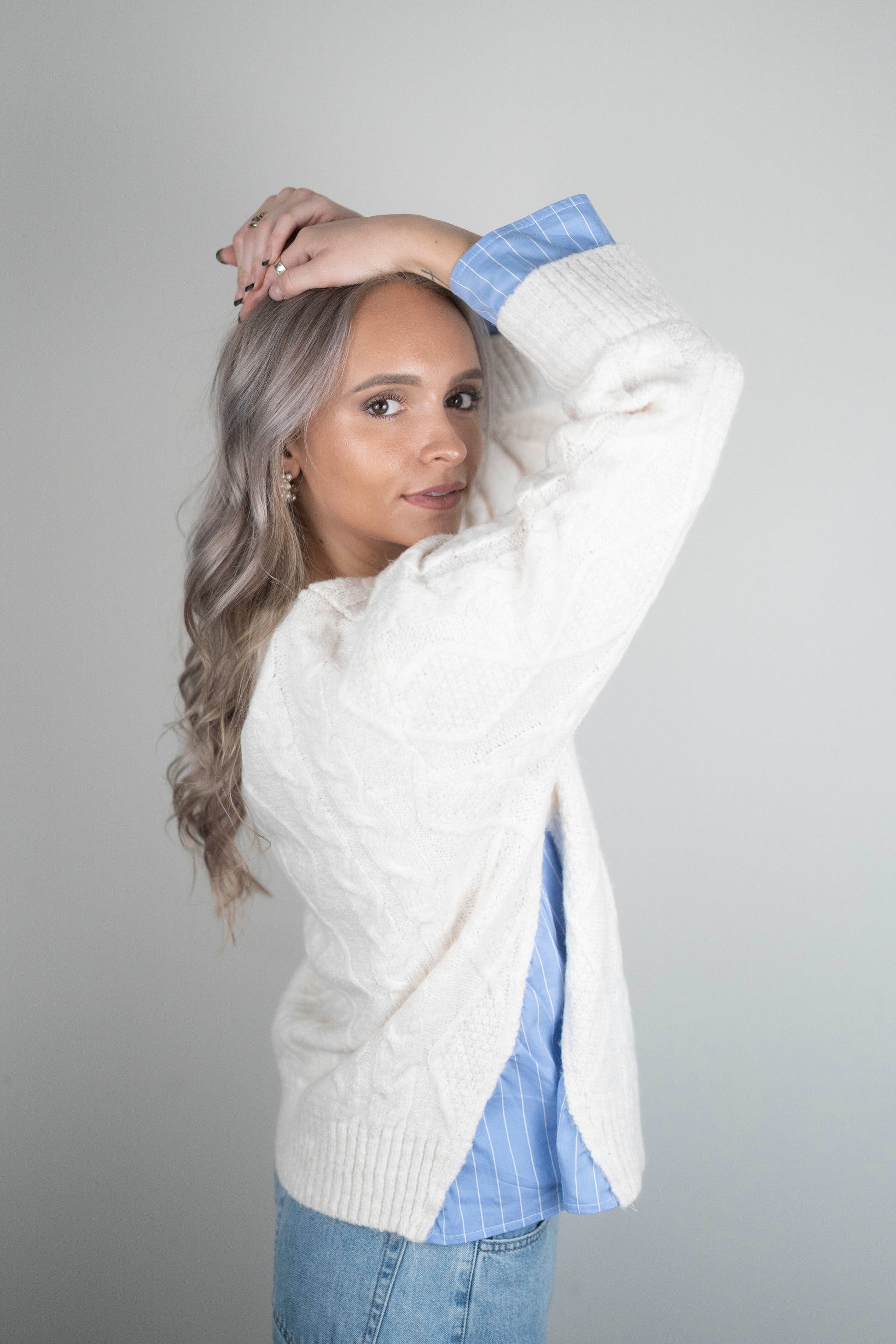 Blake Pullover - oversized cream cable-knit sweater with blue and white pinstripe shirting details at hem and cuffs, crew neckline, and long sleeves